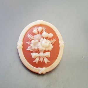 Vintage Avon faux cameo brooch